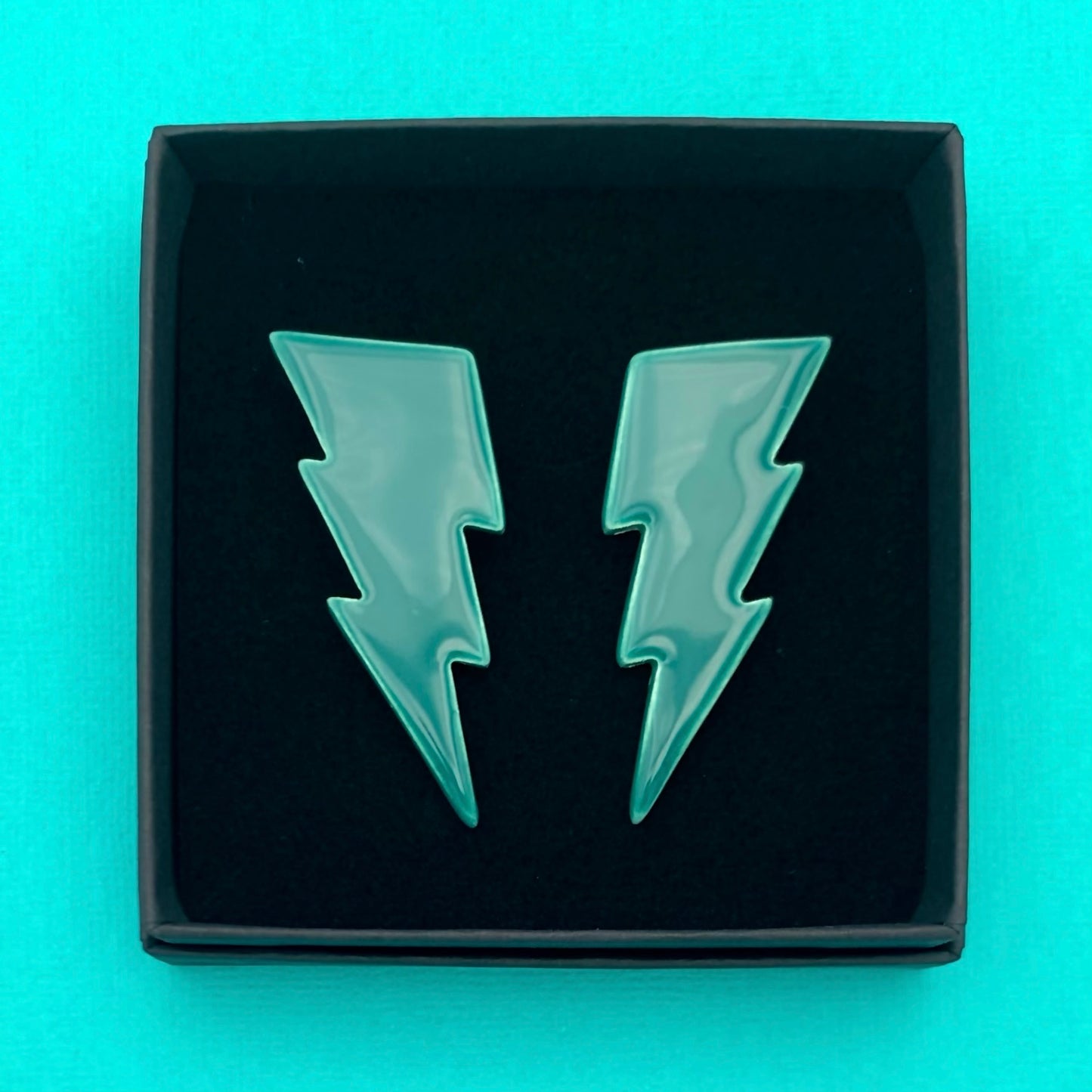Boucles d'oreilles éclair, bleu-vert