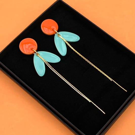 Boucles longues, orange et bleu turquoise