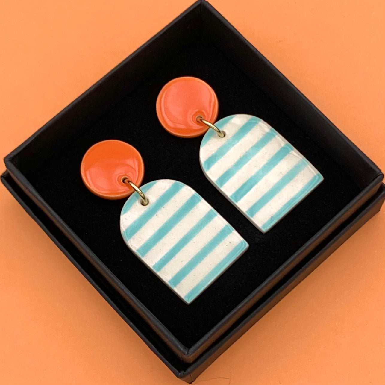 Boucles Marinière cloche, orange et turquoise